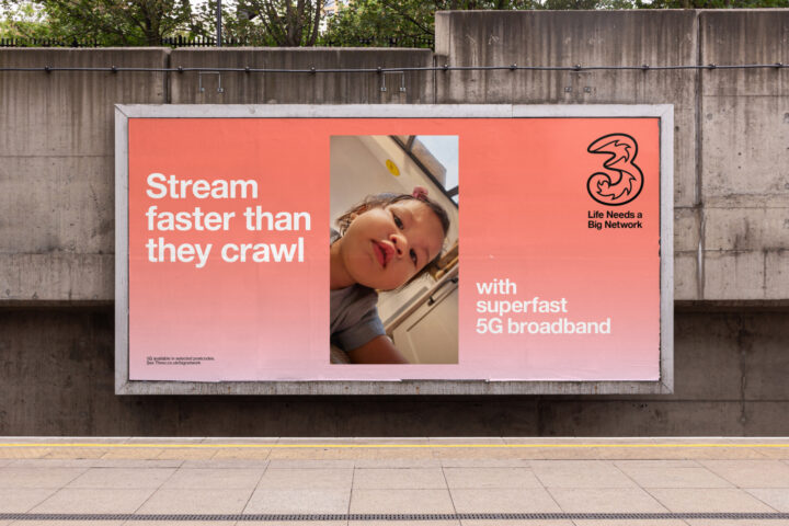 Poster on wall under bridge